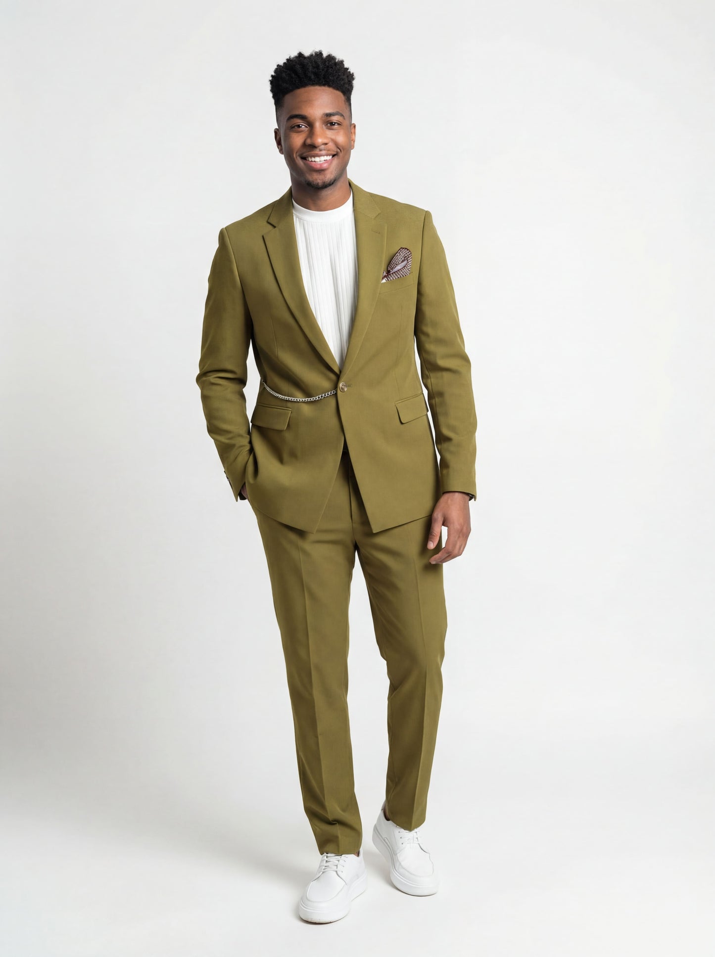 Olive green slim fit prom suit with chain detail worn by young male model