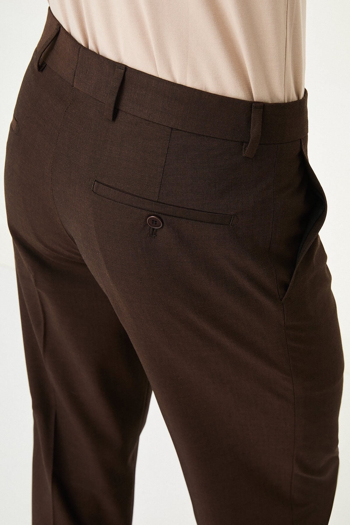 Men wearing dark brown slim-fit formal trousers with brown dress shoes, styled for summer office and formal events.