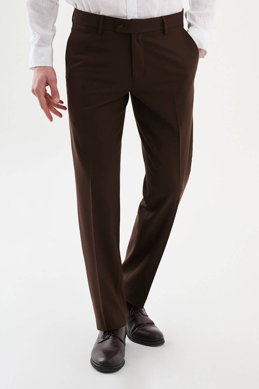 Men wearing brown slim-fit classic trousers, styled with formal shoes and a dress shirt, ideal for business and formal events.