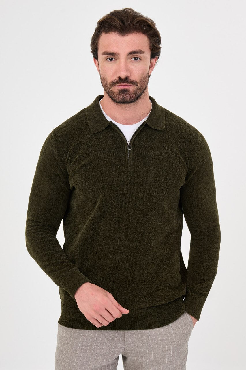 Men’s khaki polo neck knit sweater with zip collar detail styled with grey trousers for a refined fall winter smart-casual outfit.