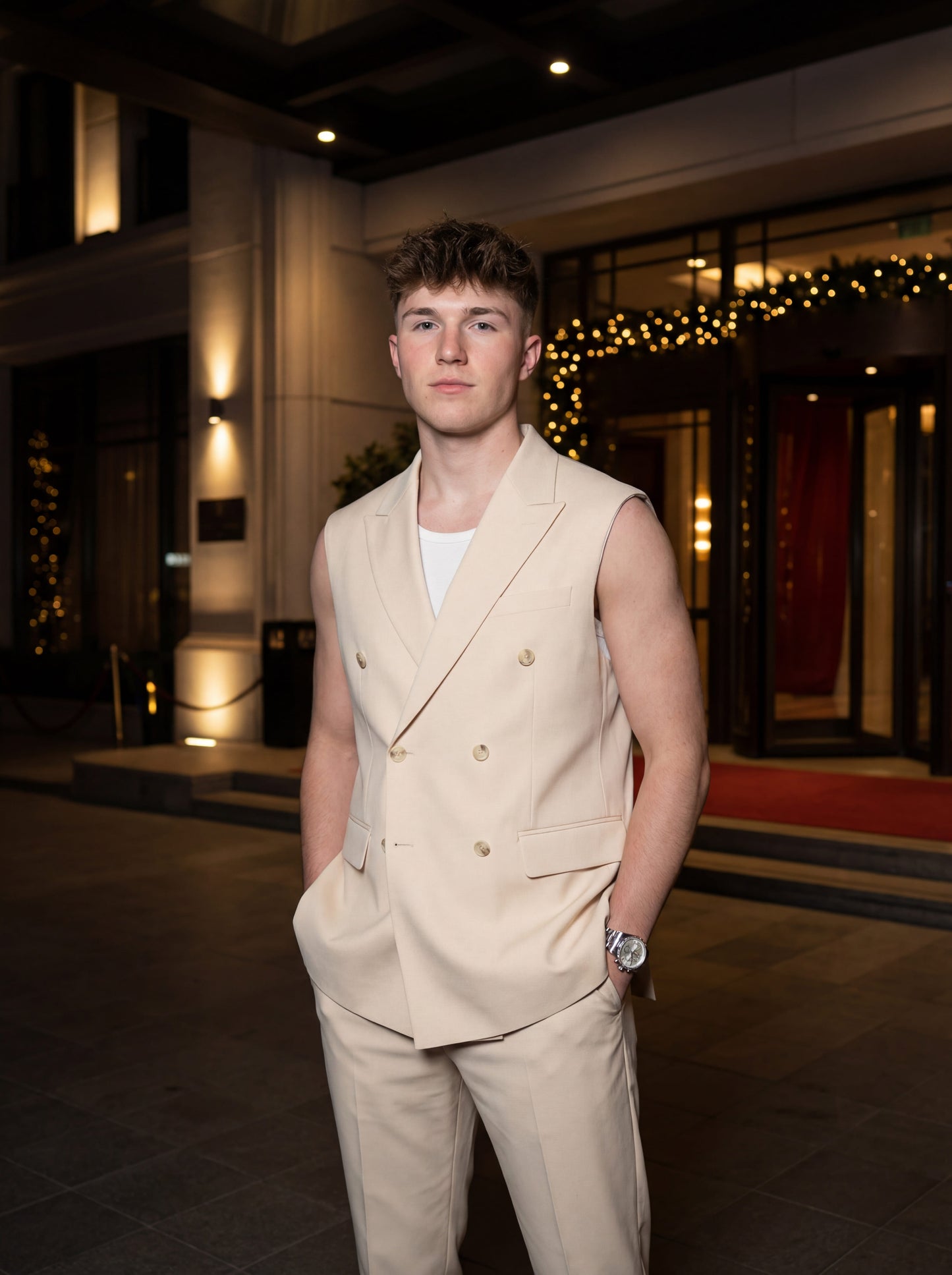 Beige sleeveless slim fit prom suit styled for modern prom night