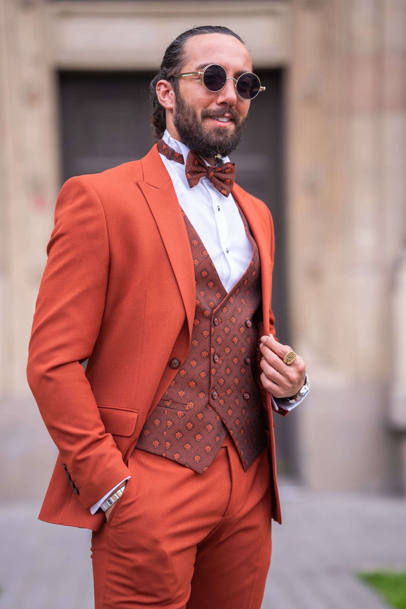 Men’s slim-fit tile collar tuxedo in slate gray with pointed collar and two-button front – styled for formal winter events, weddings, or high-fashion black-tie affairs.