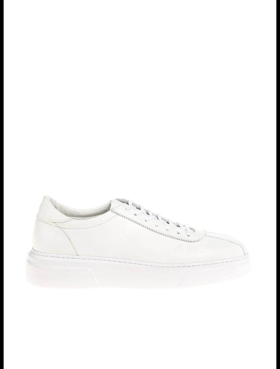 Sleek white leather low-top sneaker with clean stitching and minimal detailing. 