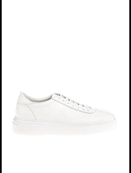 Sleek white leather low-top sneaker with clean stitching and minimal detailing. 