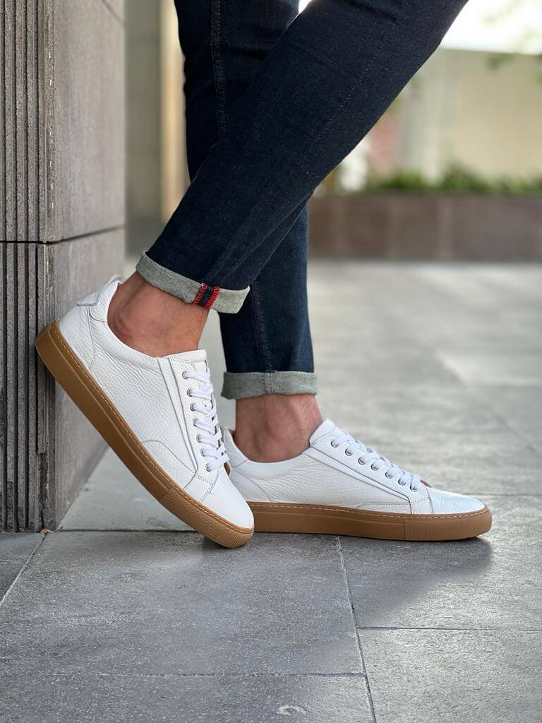White floater leather sneakers with EVA sole, featuring a minimalist low-cut design ideal for spring and summer casual wear.

