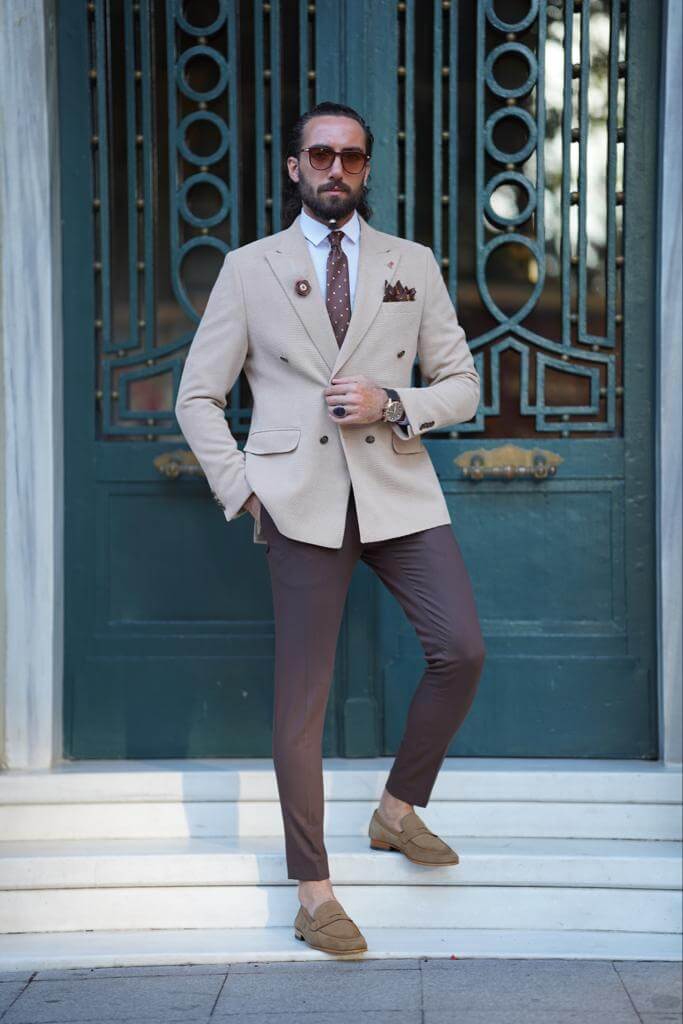 Classic beige blazer with a double-breasted closure