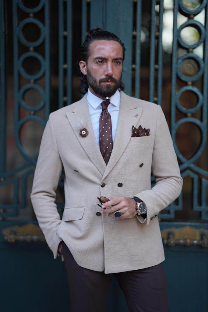 Classic beige blazer with a double-breasted closure