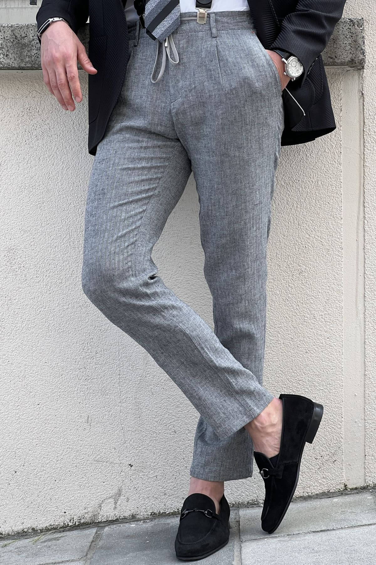 A Slim Fit Beige Gray Trouser on display