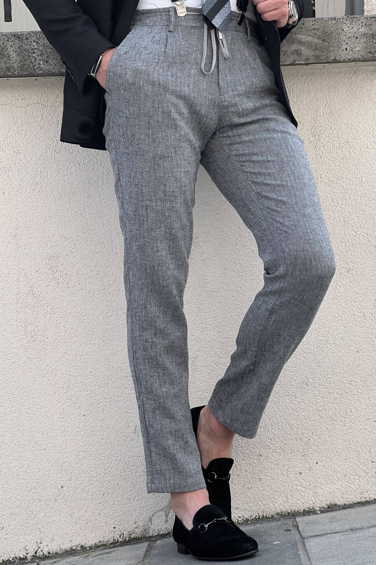 A Slim Fit Beige Gray Trouser on display