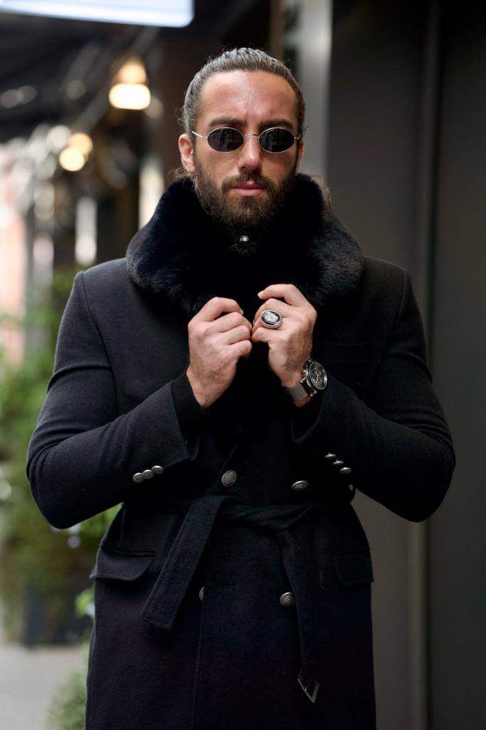 Classy black double-breasted coat made from cozy wool fabric