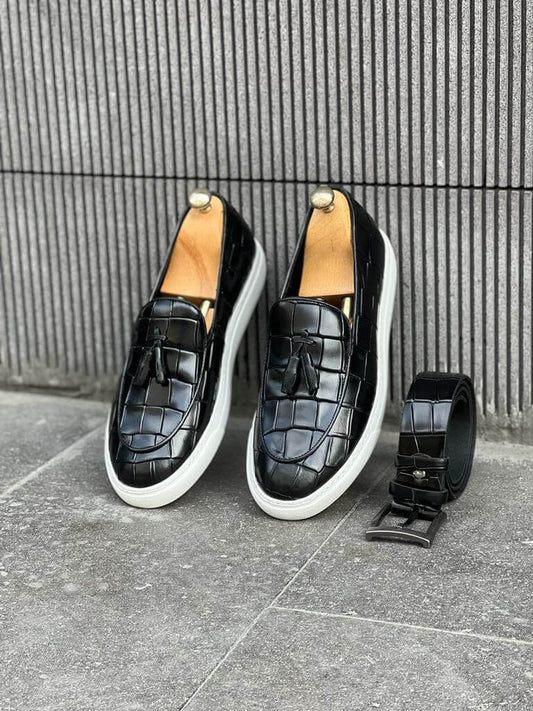 Black leather tassel loafers with a white EVA sole, slip-on design for effortless summer style and lightweight wearability.
