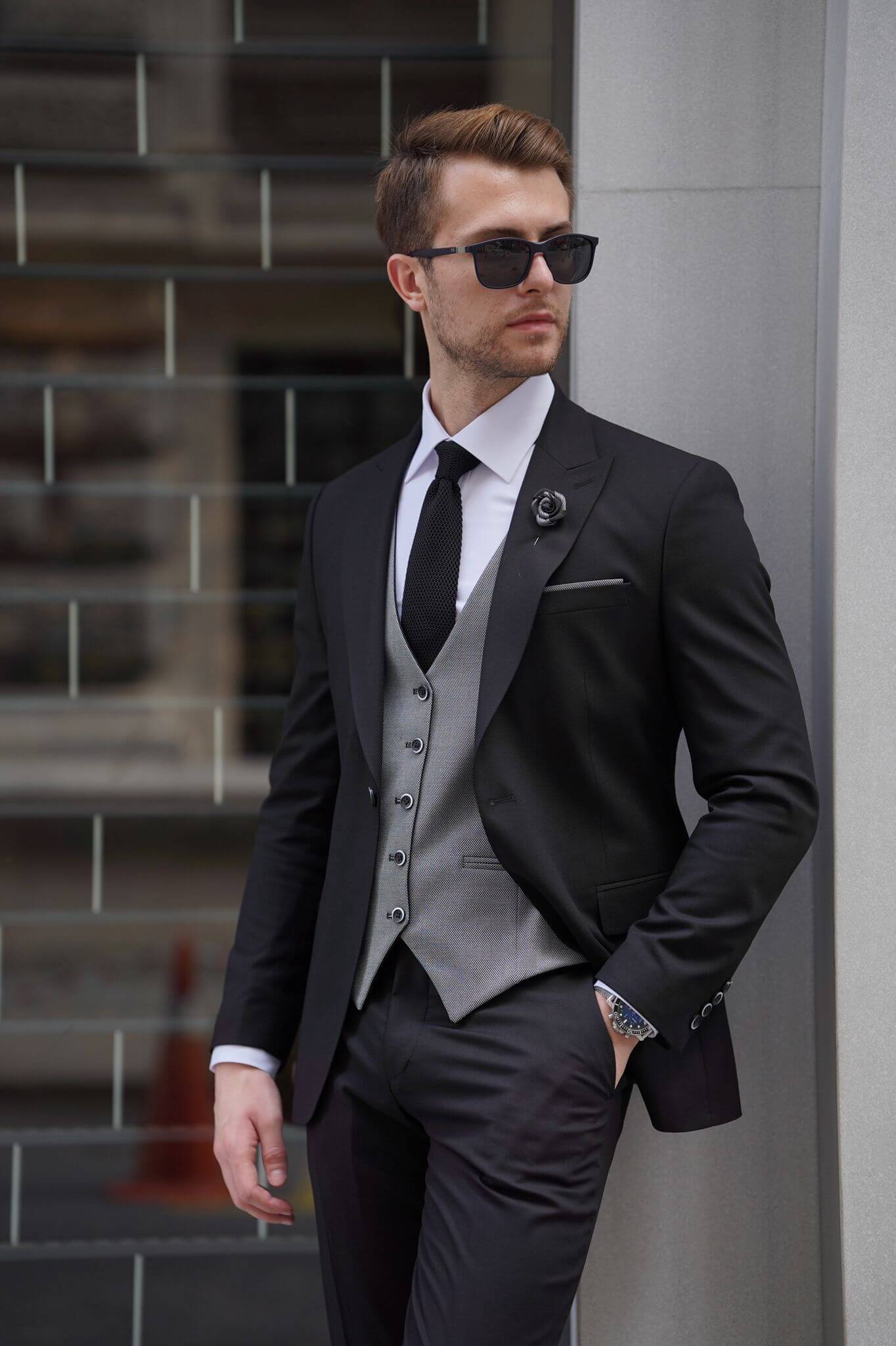 A Slim Fit Wool Black and Gray Suit on display.