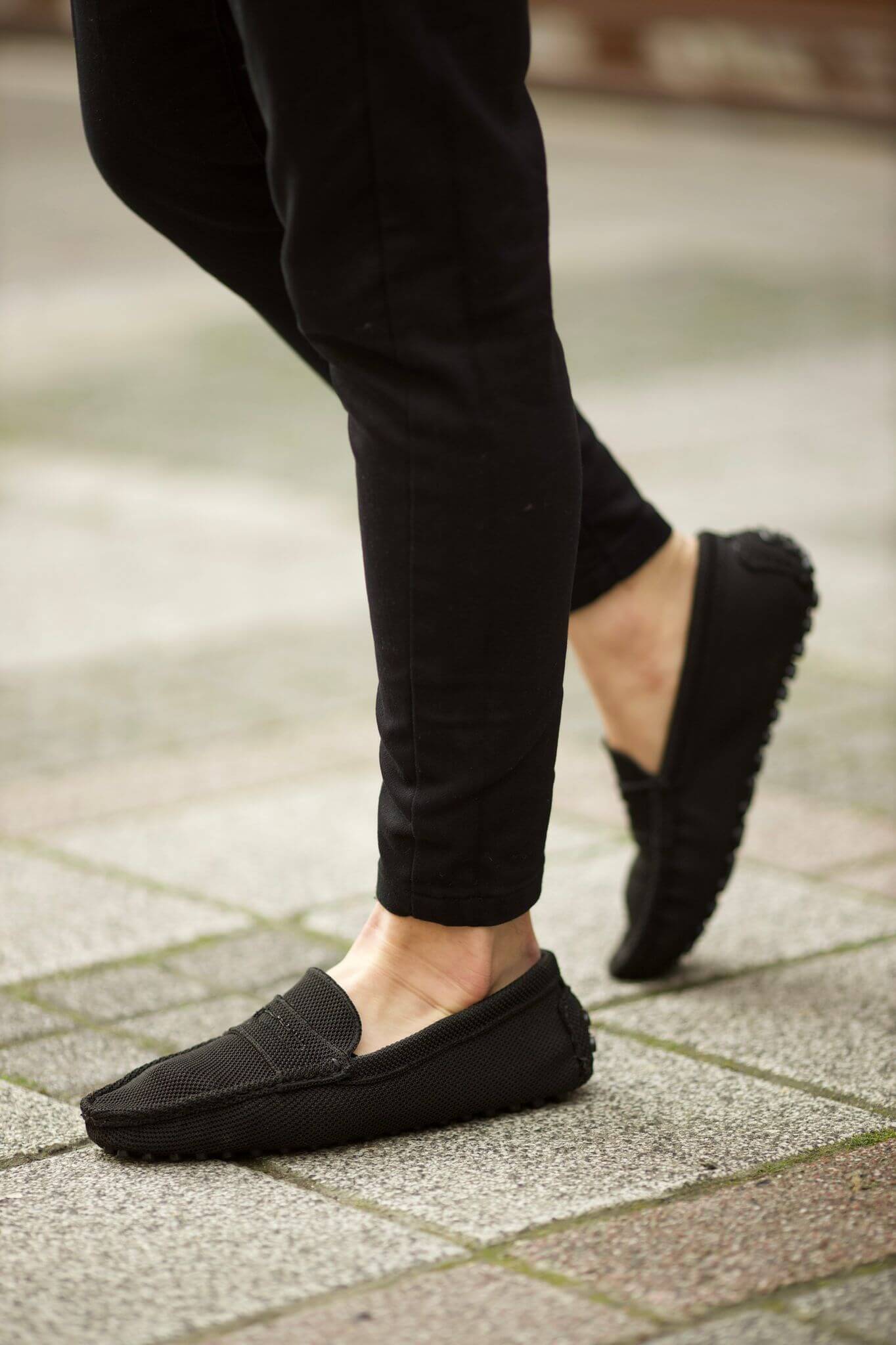 A Black Leather Knitwear Loafer on display.