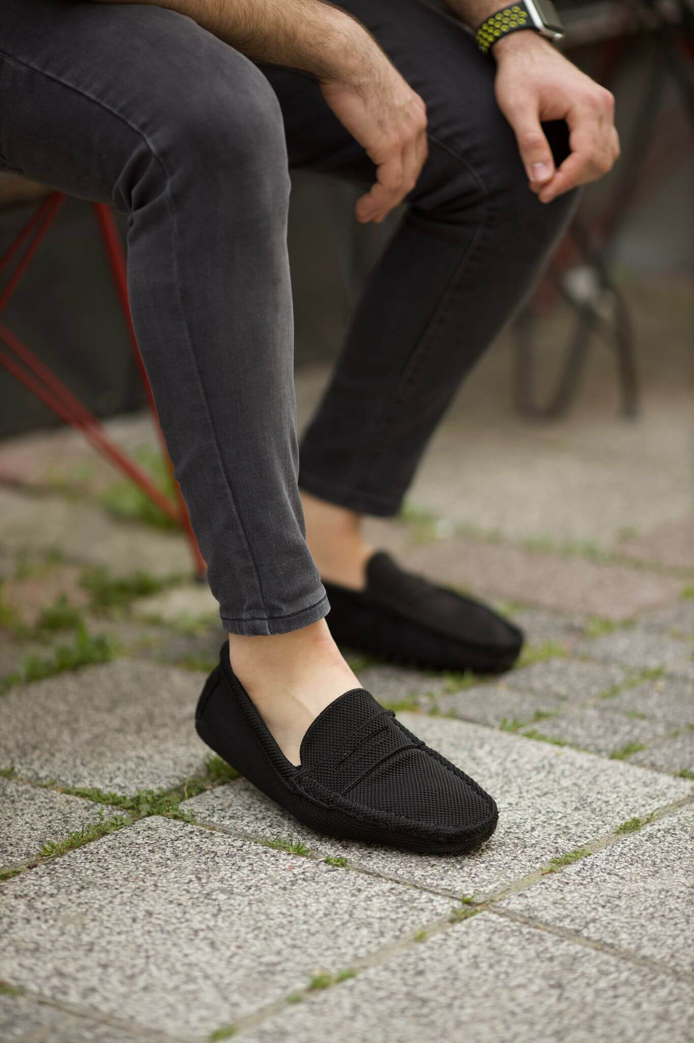 A Black Leather Knitwear Loafer on display.