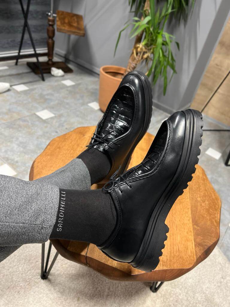 حذاء جلد أسود