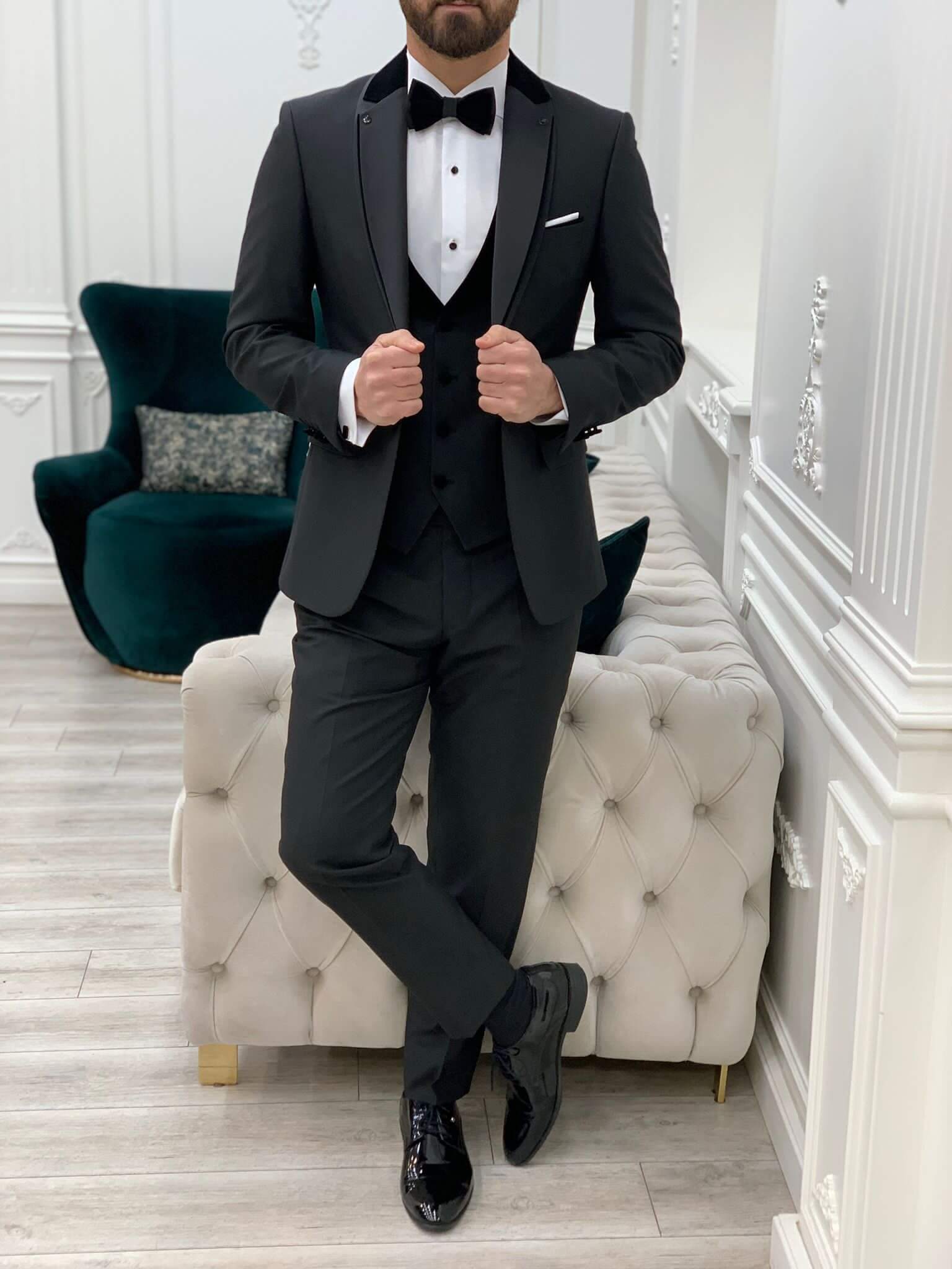 Model Wearing Black Tuxedo with Unique Shawl Lapel, Single Button, Double Slit, Slim-Fit Italian Cut at Formal Event