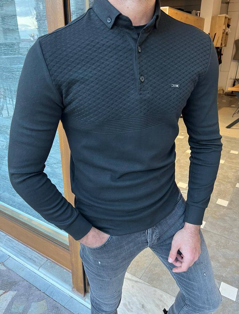 A black polo collar knitwear with a textured pattern, perfect for a sophisticated and casual look."
