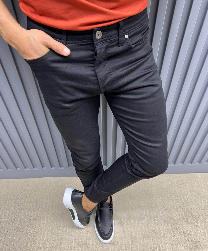 A Black Slim Fit Jeans on display