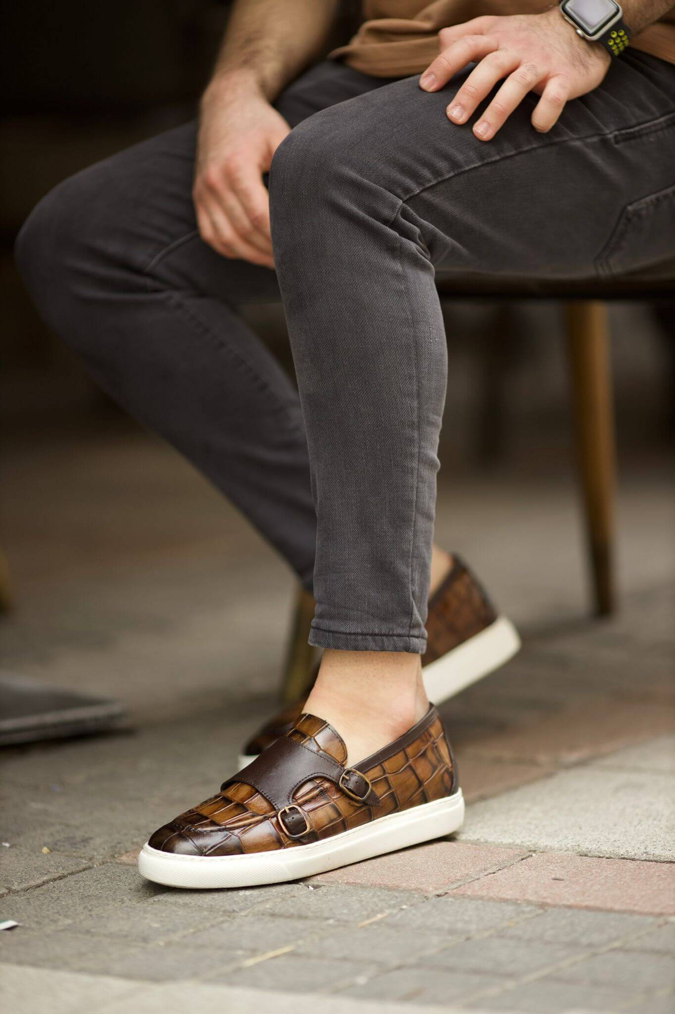 A Brown Buckled Detailed Loafer on display.