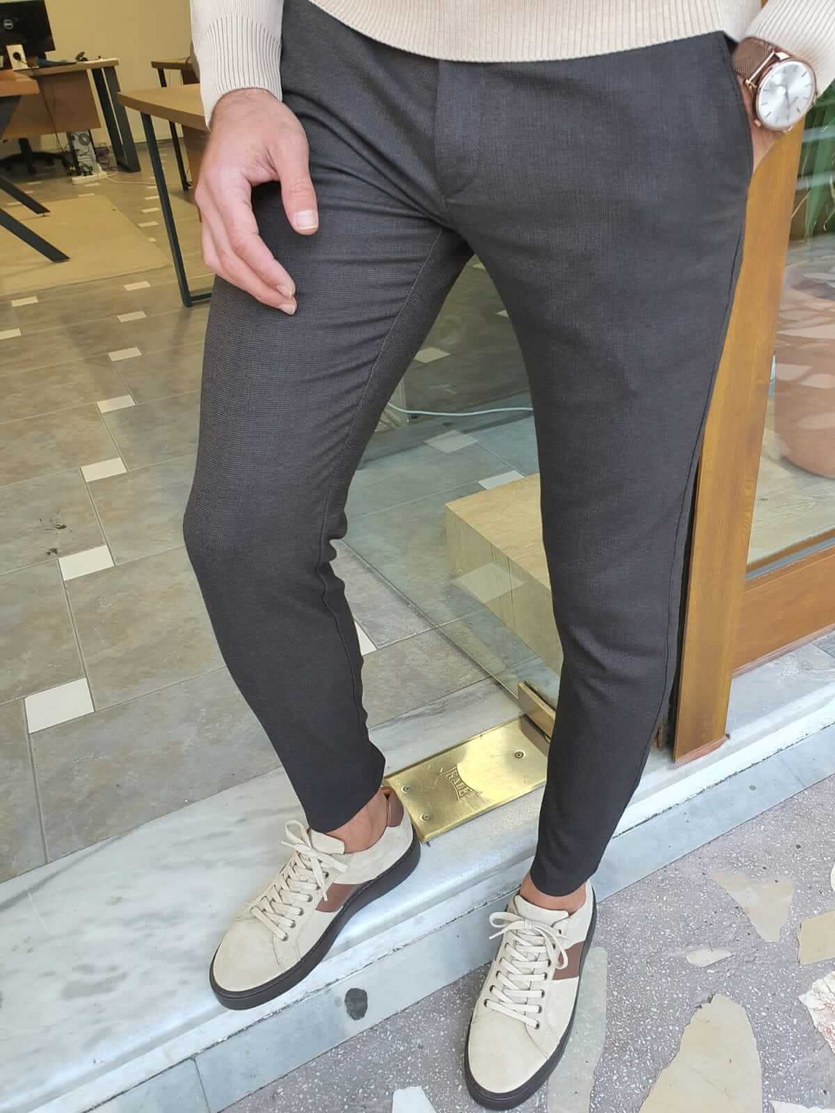 A pair of stylish brown plaid trousers with a timeless pattern