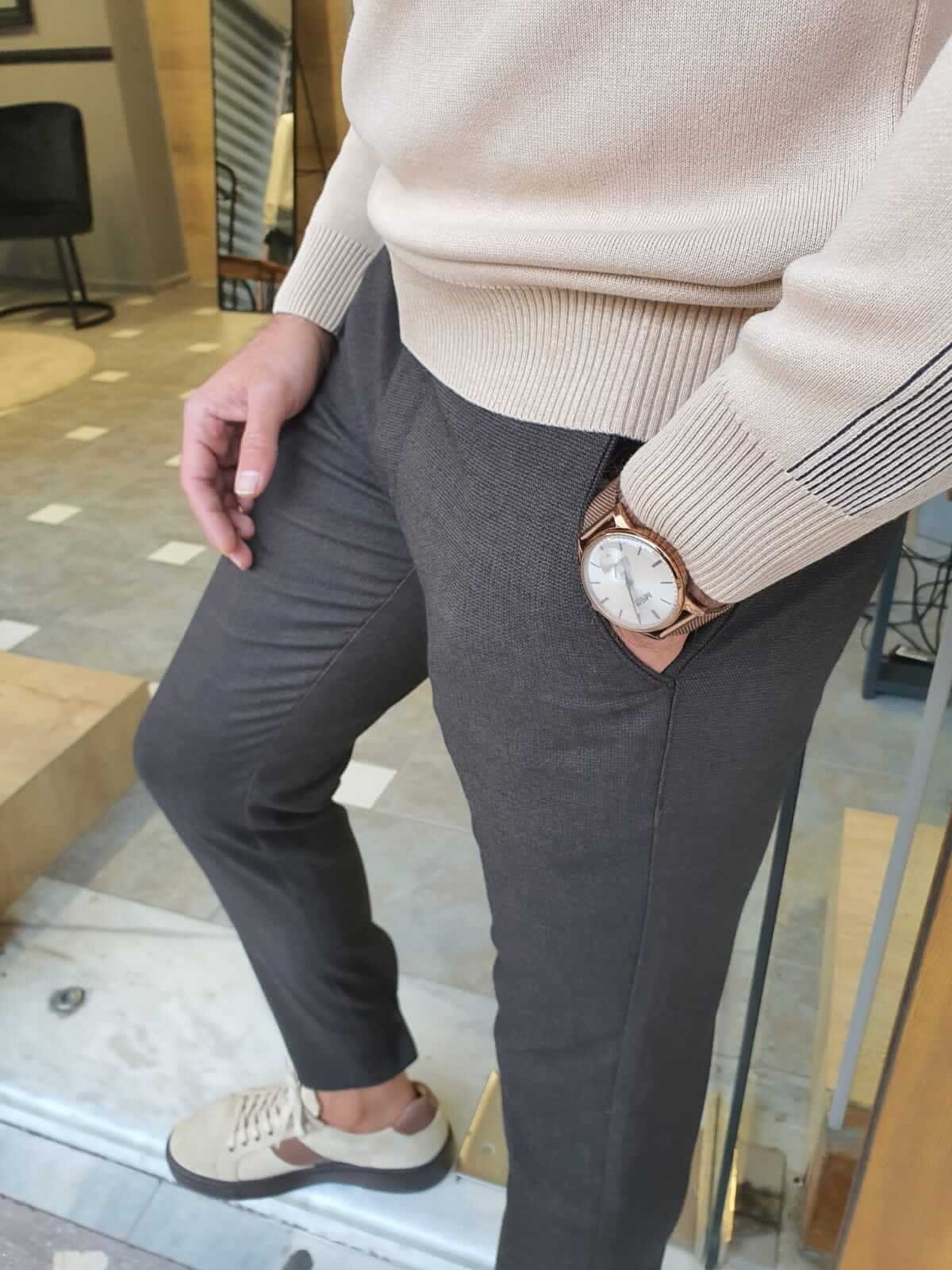 A pair of stylish brown plaid trousers with a timeless pattern