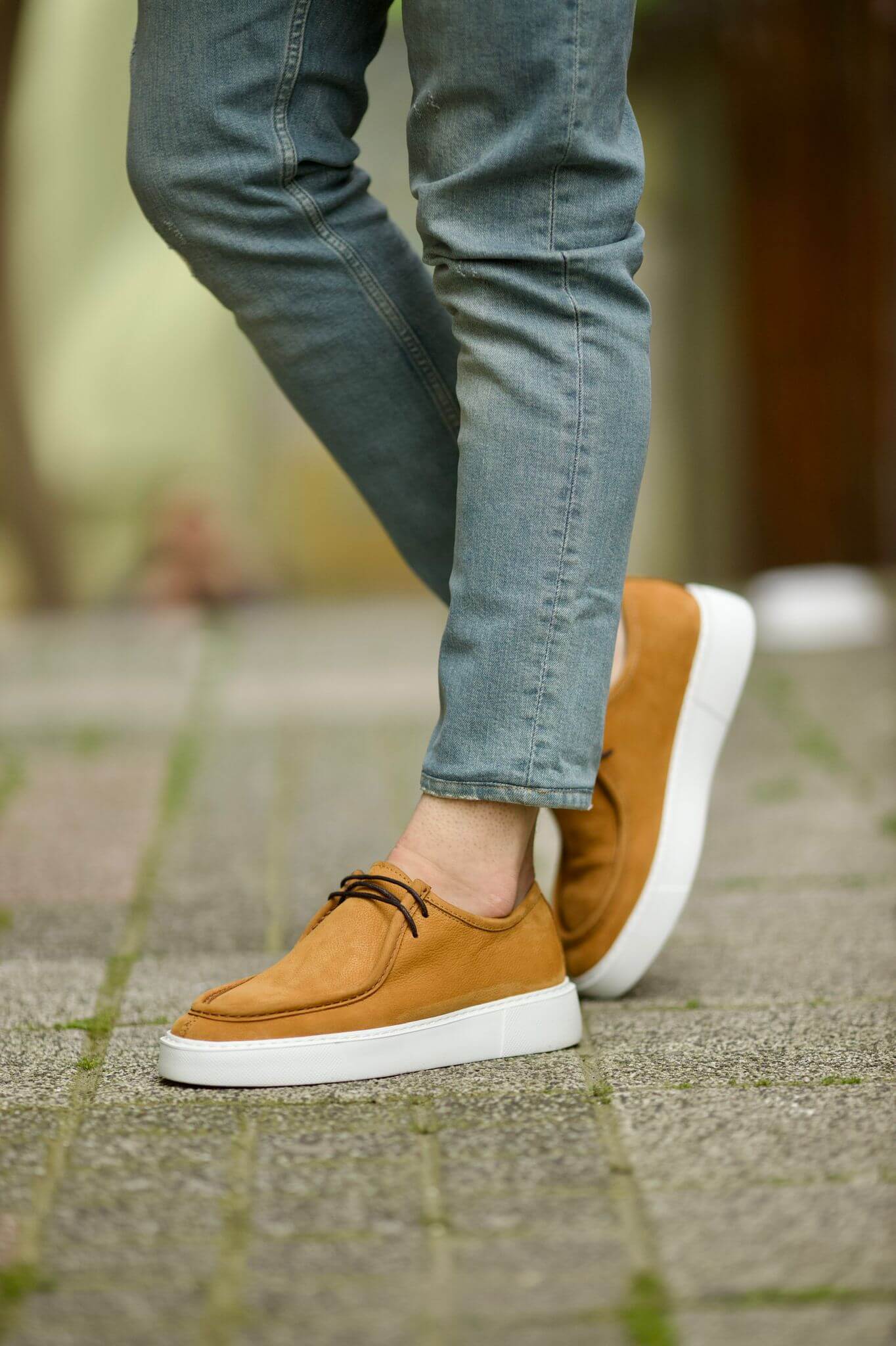 A Camel Casual Lace Up shoe on display.