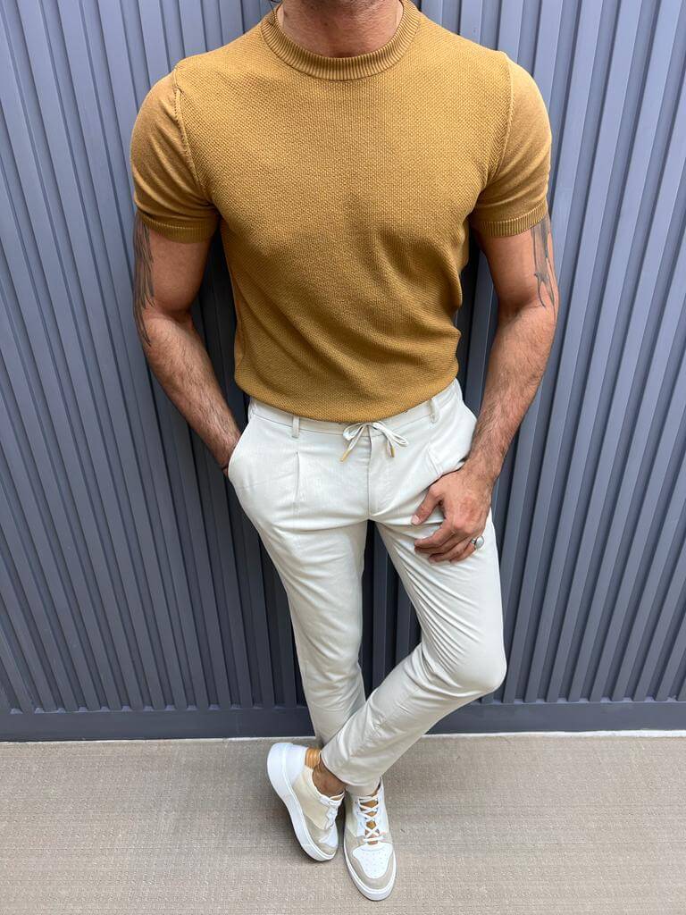 Camel-colored knit t-shirt with textured pattern