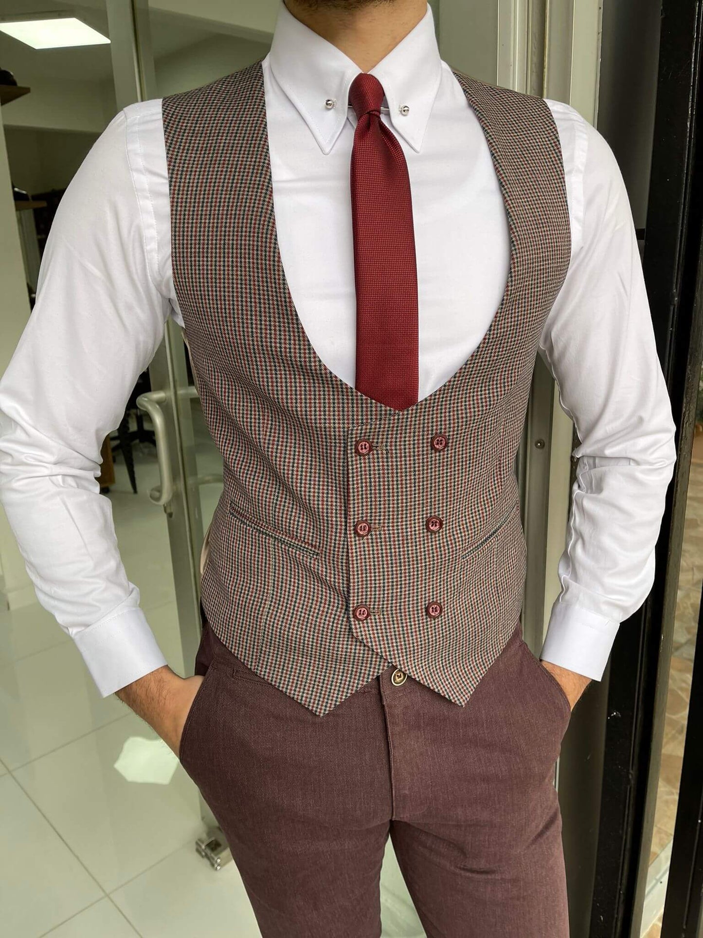 A formal claret red vest with a double-breasted front