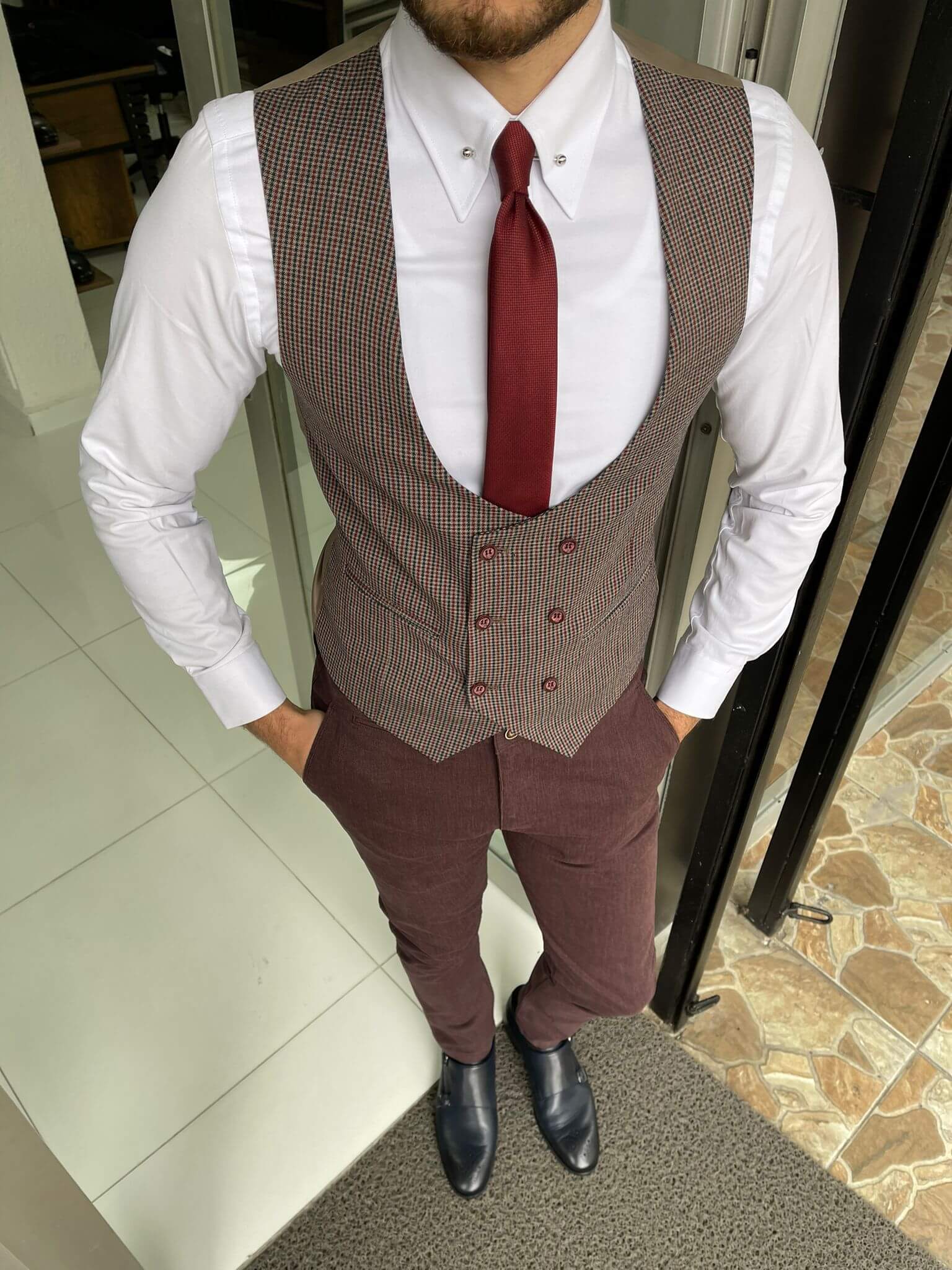 A formal claret red vest with a double-breasted front