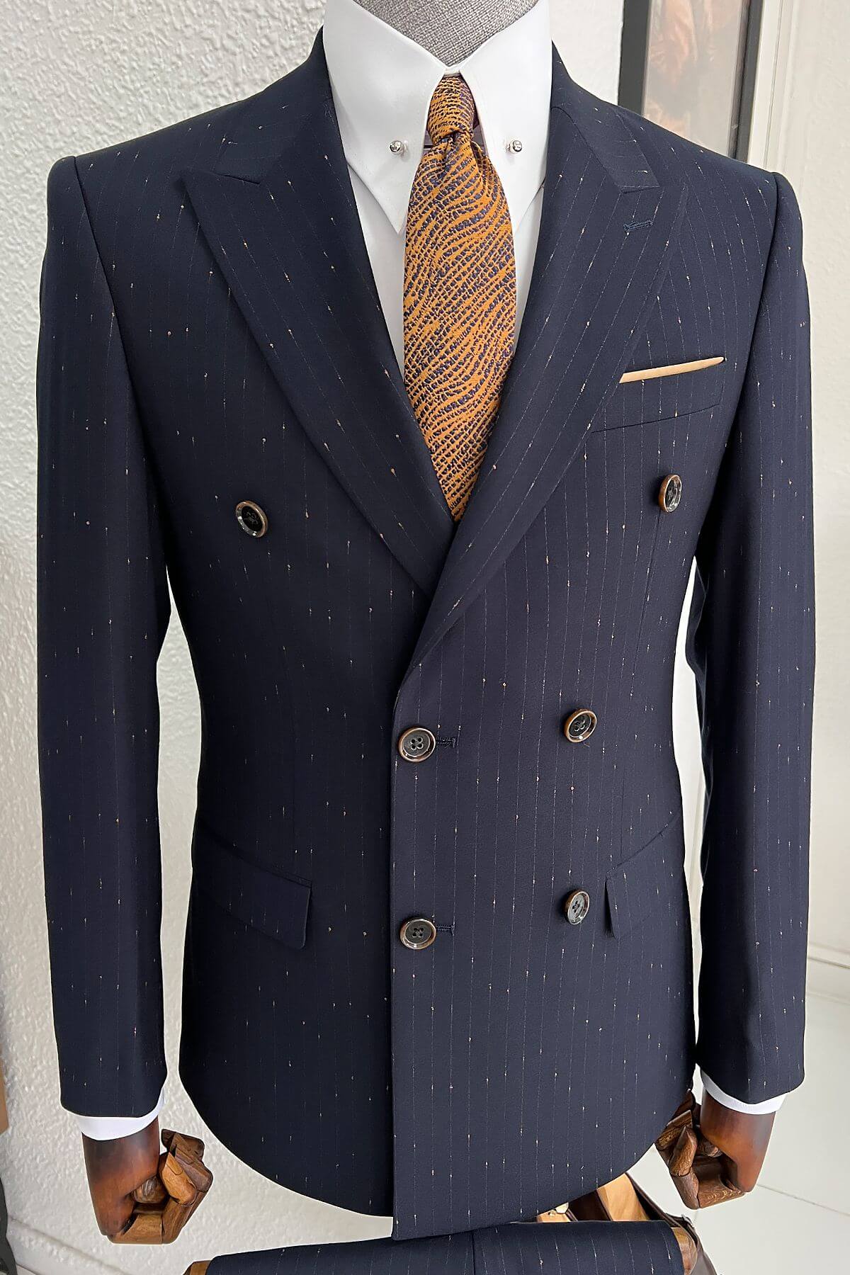 A Double-Breasted Navy-Blue Wool Suit on display