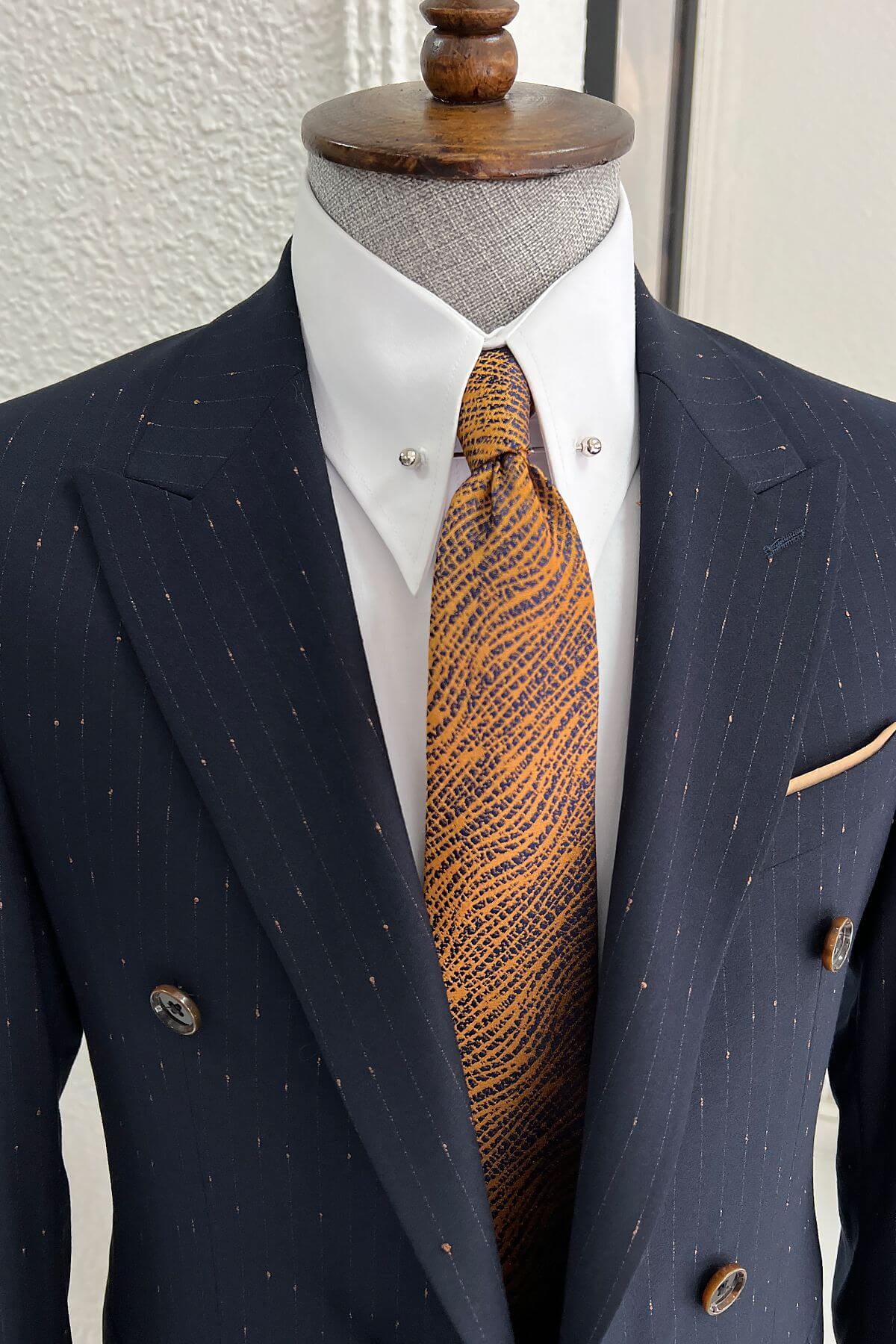A Double-Breasted Navy-Blue Wool Suit on display