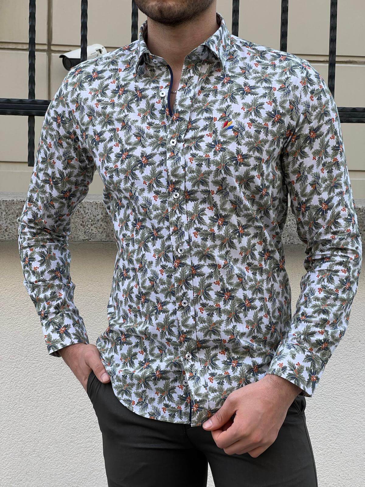 A stylish green shirt adorned with beautiful flowers