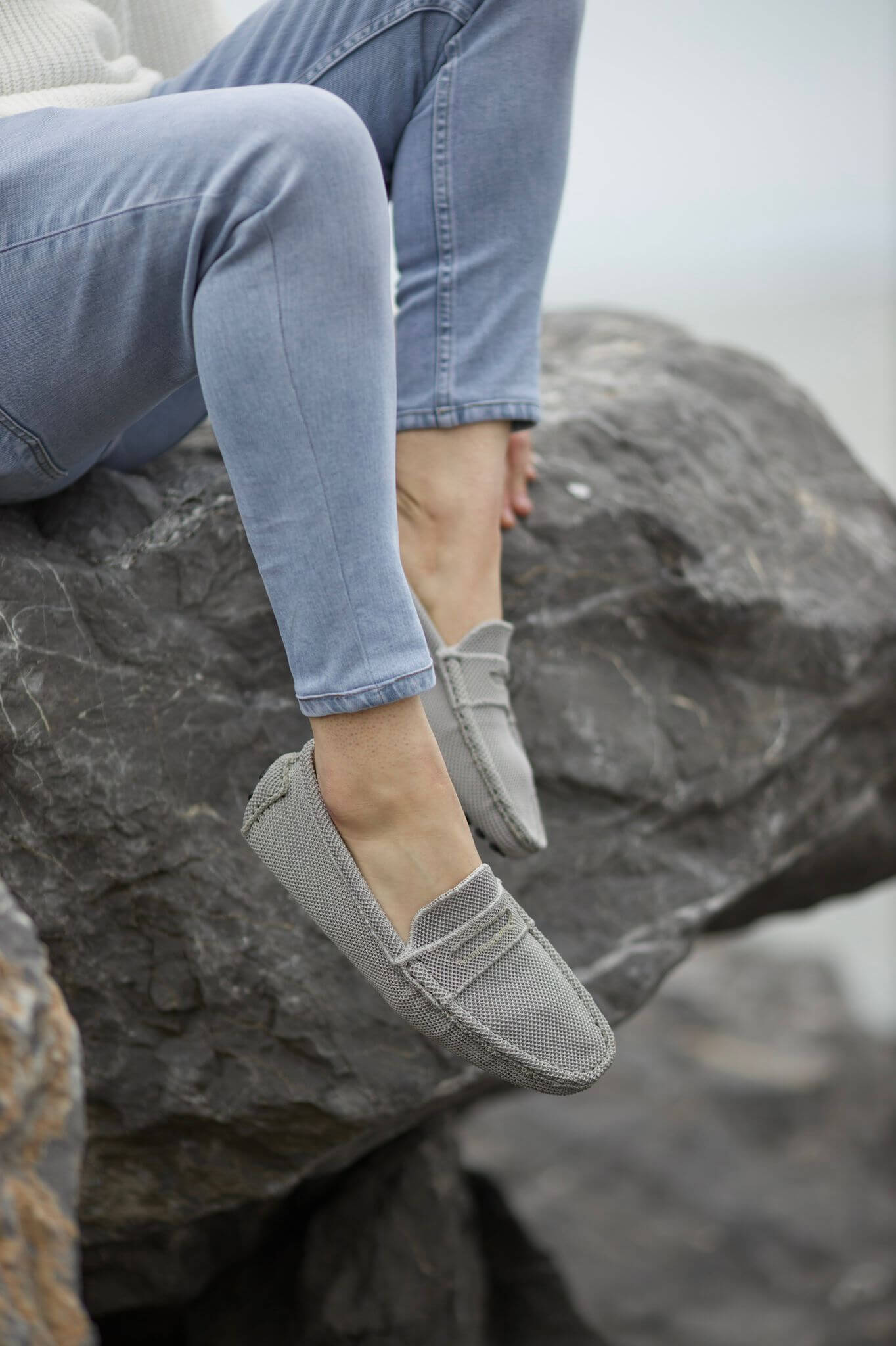 A Gray Driving Loafer on display.