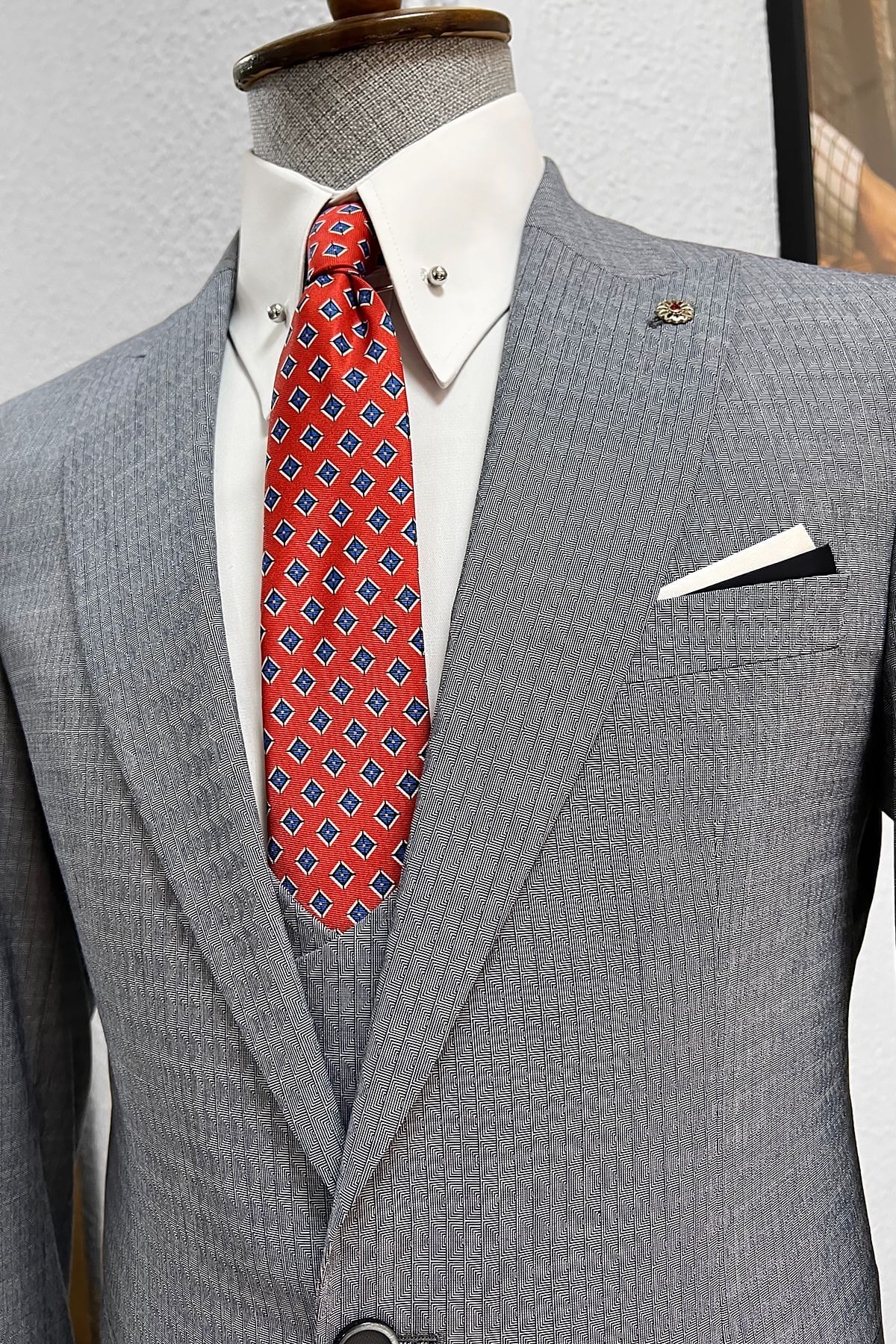 A Slim-fit Gray&Navyblue Wool Suit on display