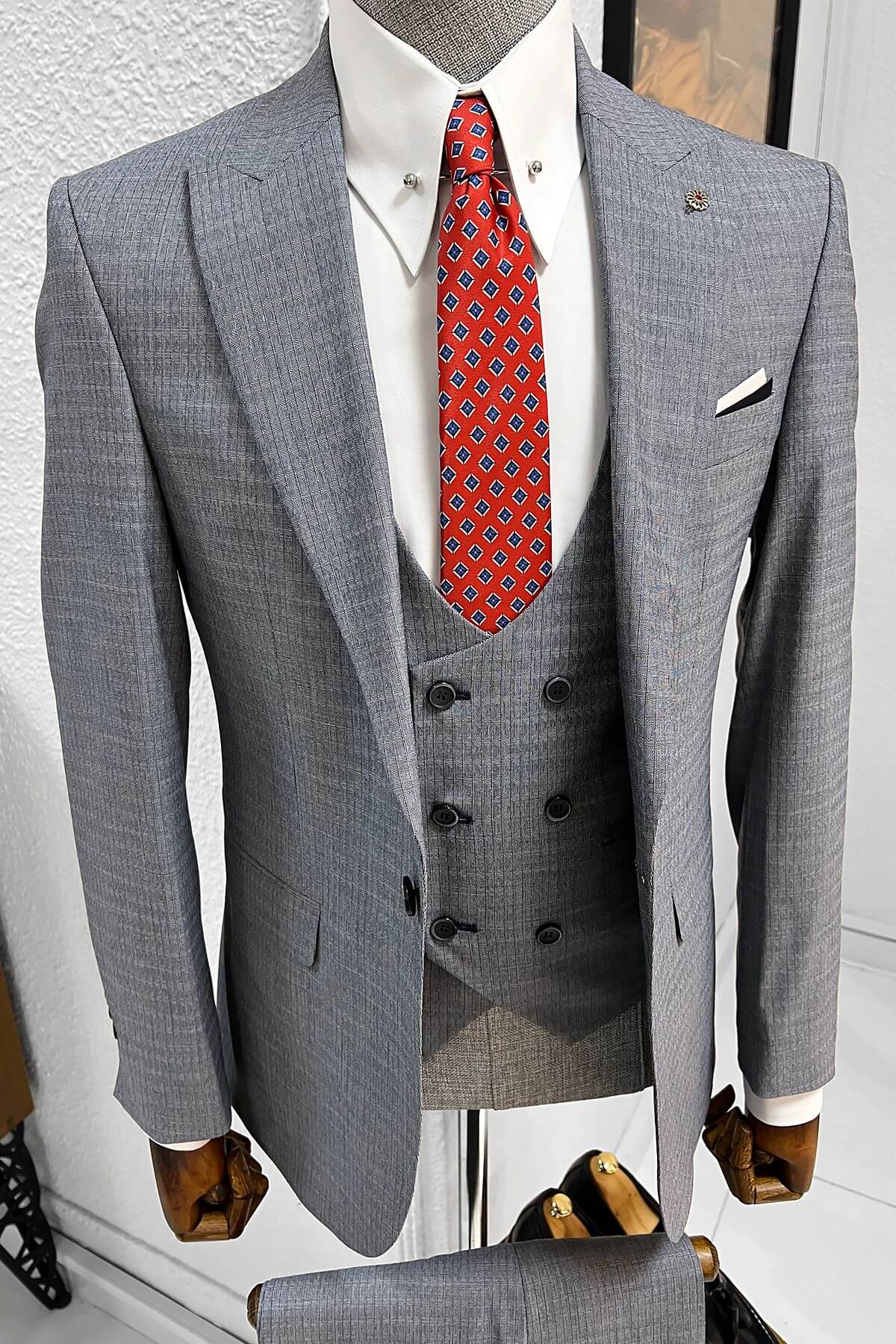 A Slim-fit Gray&Navyblue Wool Suit on display
