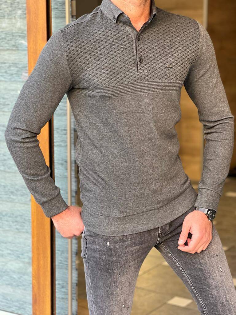 A gray knitwear with a classic polo collar, featuring a textured pattern and a comfortable fit."
