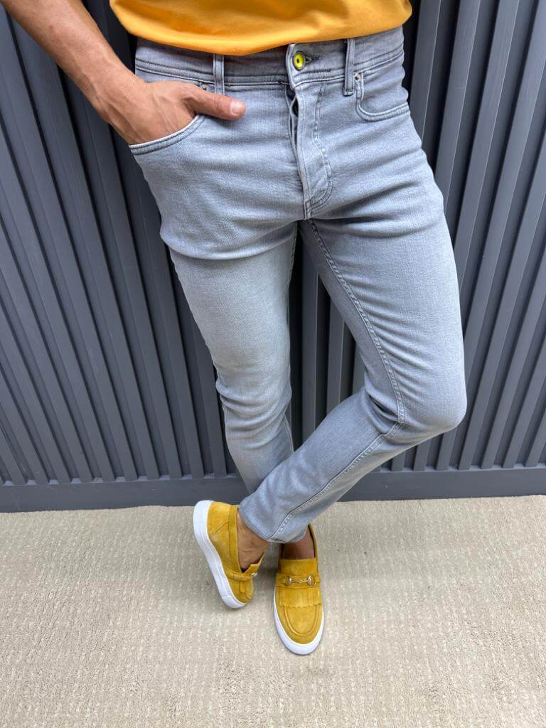 A Grey Slim Fit Jeans on display