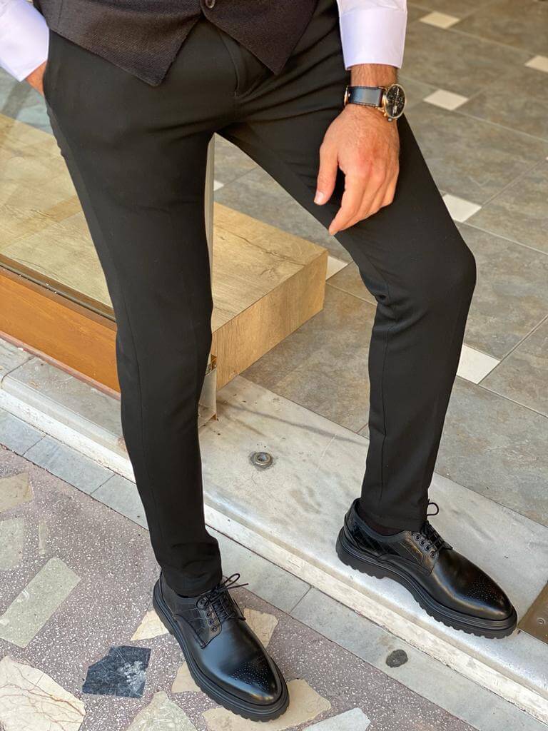 Sleek and stylish black slim fit trousers from Hollomen