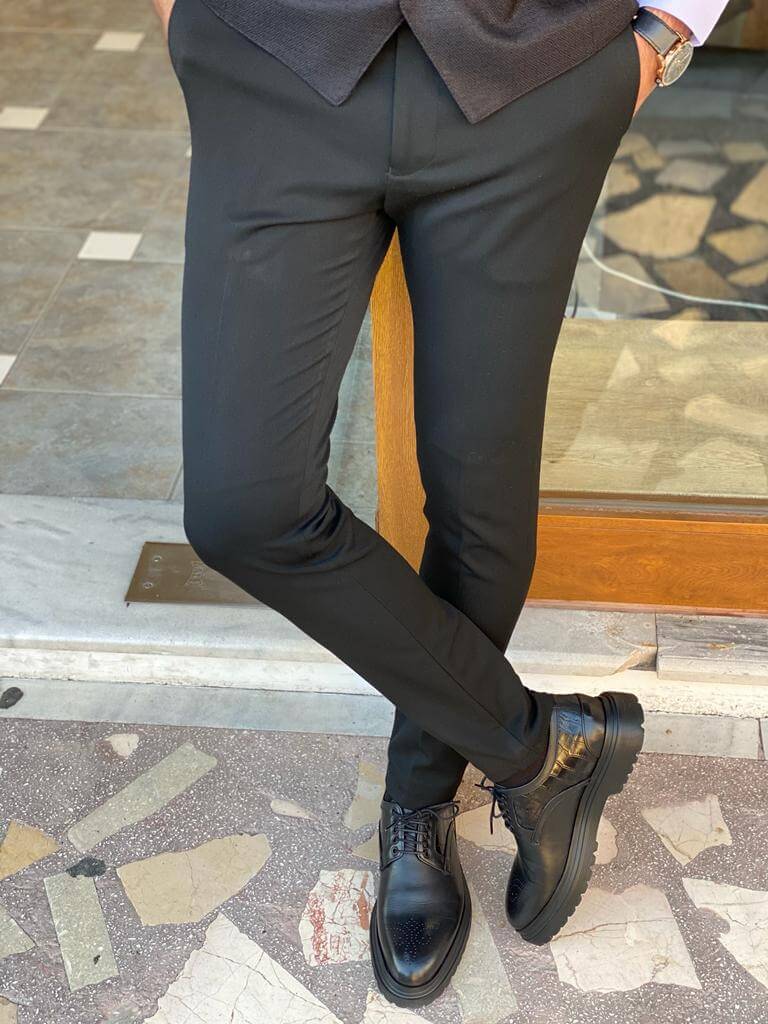 Sleek and stylish black slim fit trousers from Hollomen