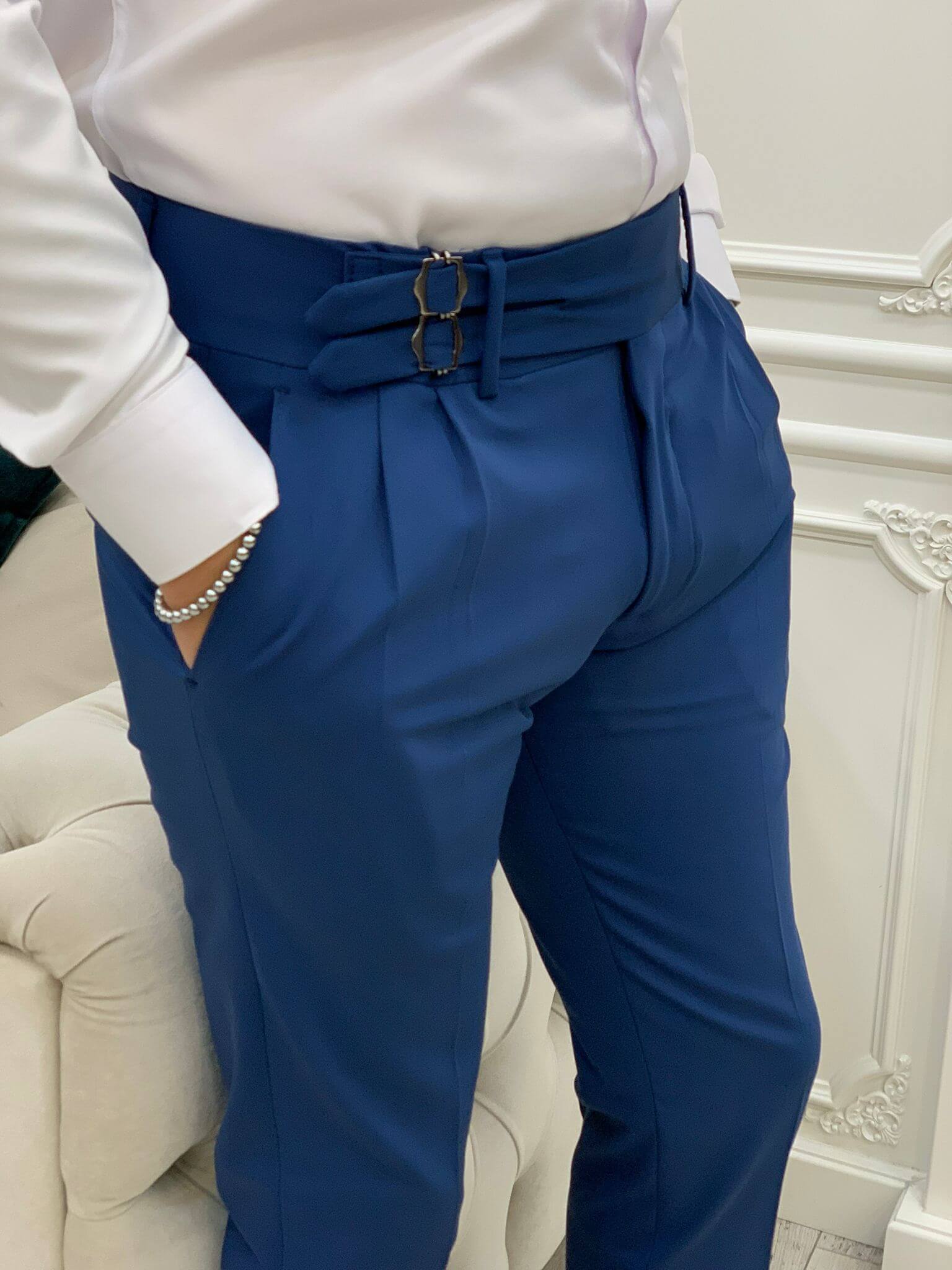 Hollo Blue Buckled Pants: Sleek and stylish pants with eye-catching buckled details