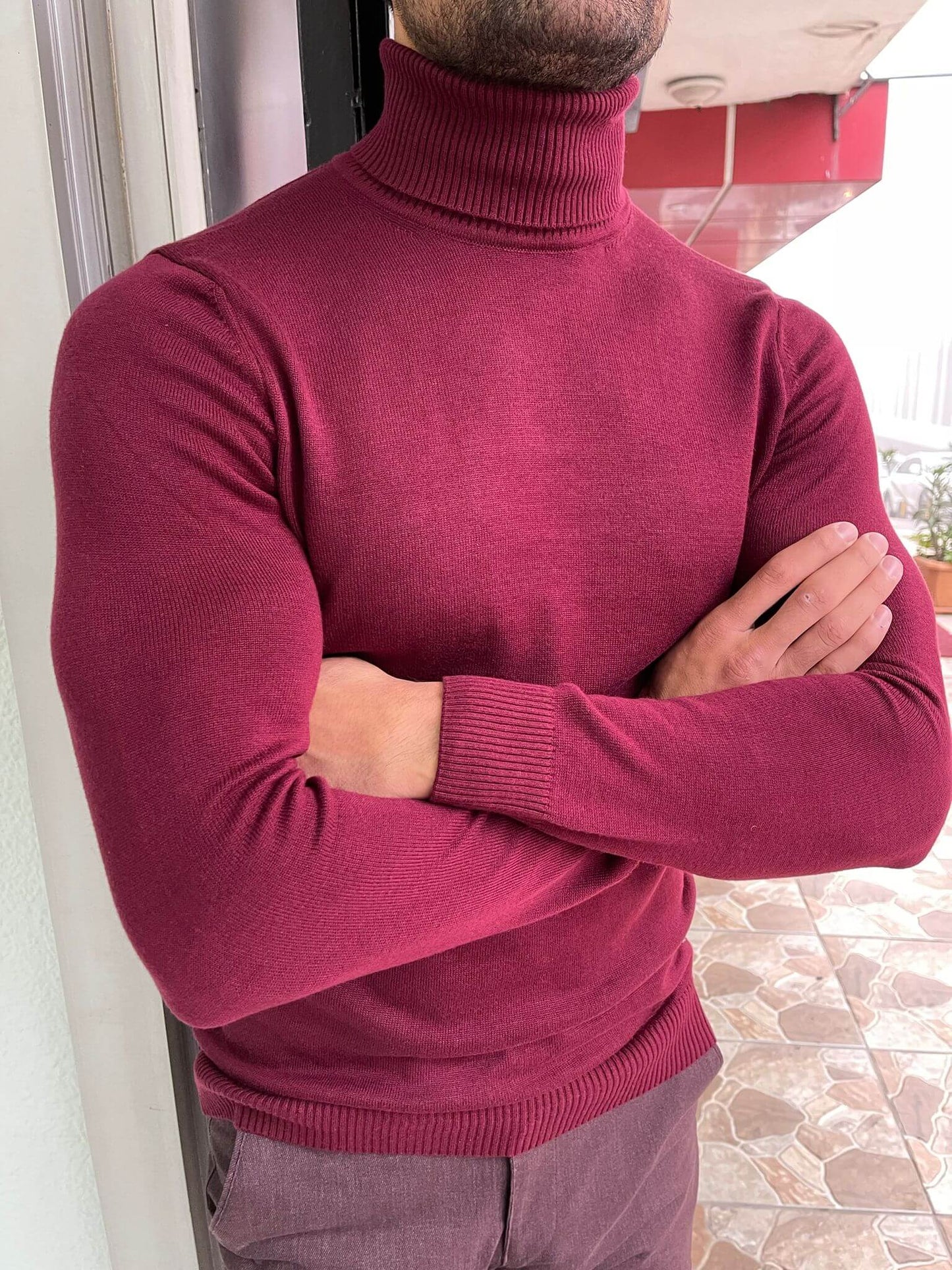 Claret Red Turtleneck sweater, featuring a high neckline and a smooth, ribbed texture.