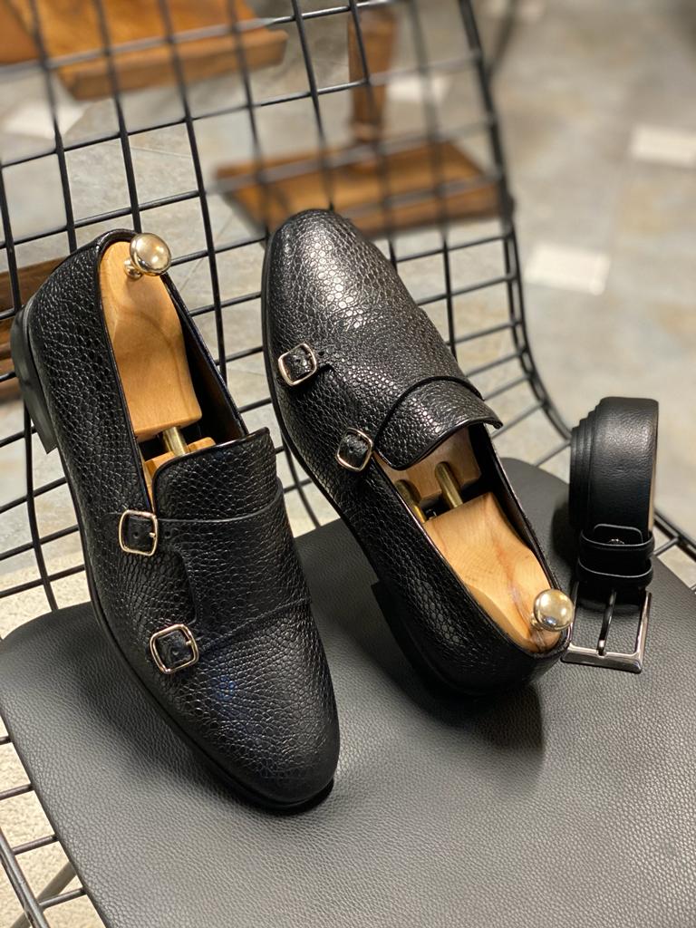 Black double buckle monk strap shoes crafted from premium leather with a neolite sole, designed for elegant fall-winter wear.
