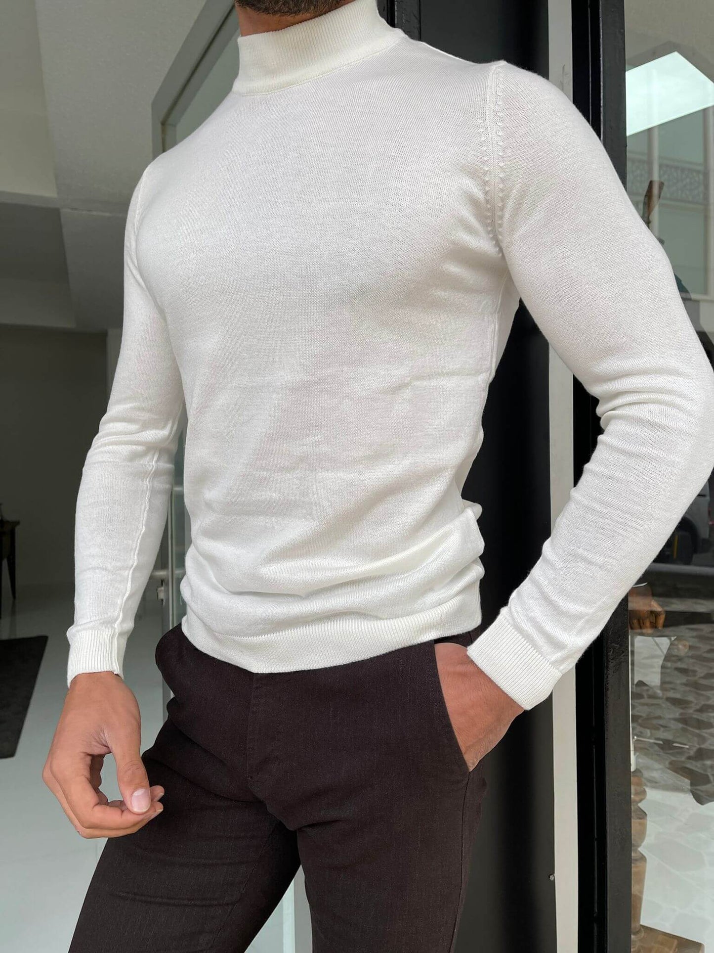 "An elegant Hollo Ecru Turtleneck, a soft and cozy turtleneck sweater in a neutral ecru color, perfect for cool weather and versatile for any occasion