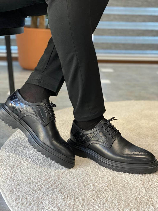 Premium black leather derby shoes displayed against a neutral background. Featuring sleek stitching, polished finish, and durable EVA soles—perfect for formal and business wear.