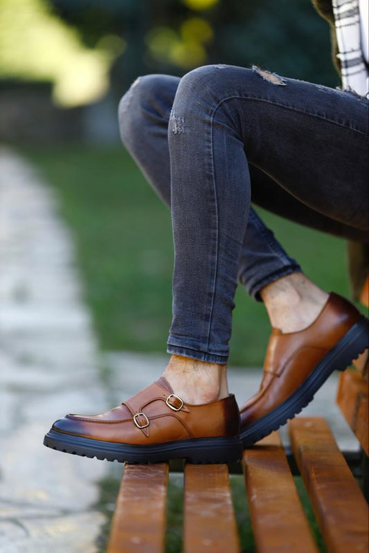 Camel brown monk strap shoes made from genuine leather, featuring double buckle detail and a sleek EVA sole for comfort and modern sophistication.