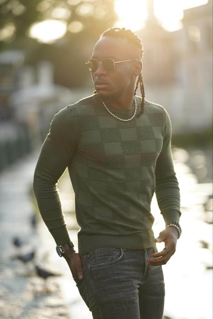 Khaki crewneck sweater, featuring a relaxed fit,and a classic crew neckline."