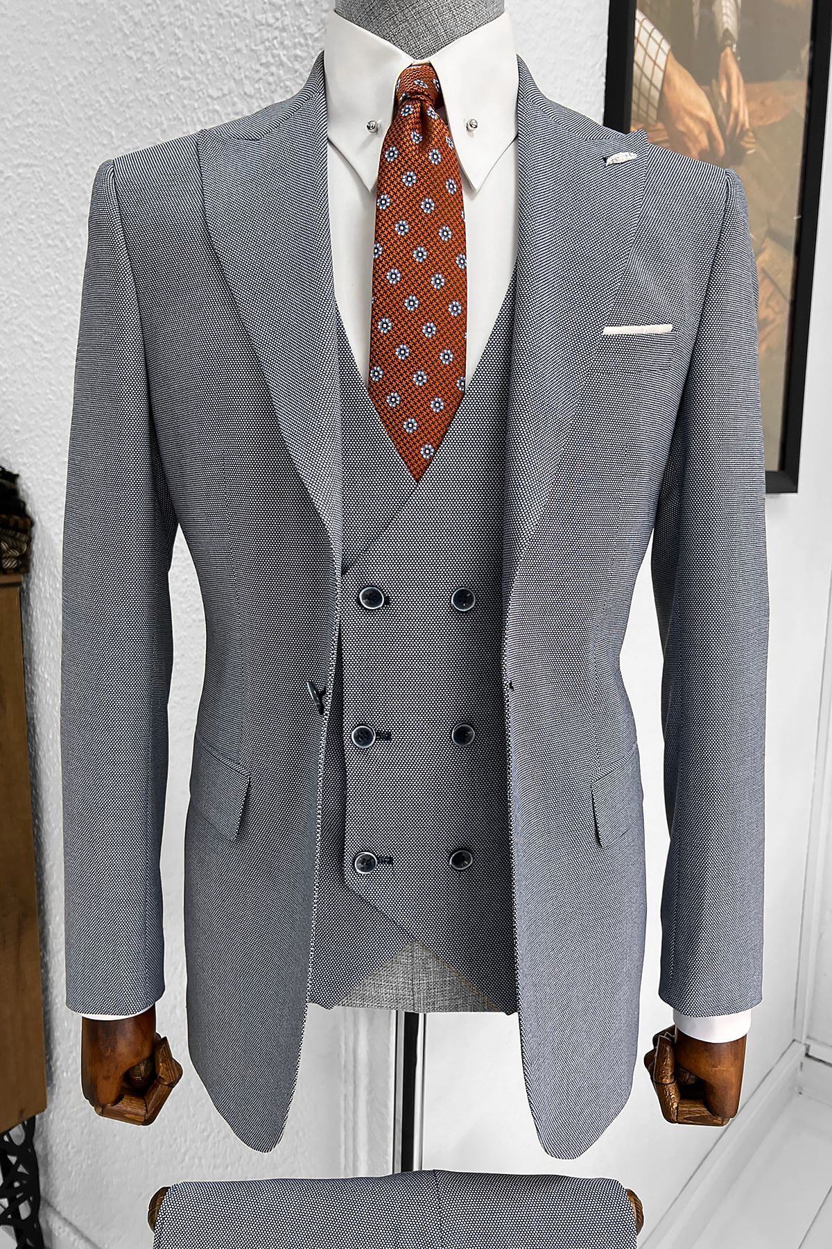 A Patterned Slim-fit Light Blue Wool Suit on display