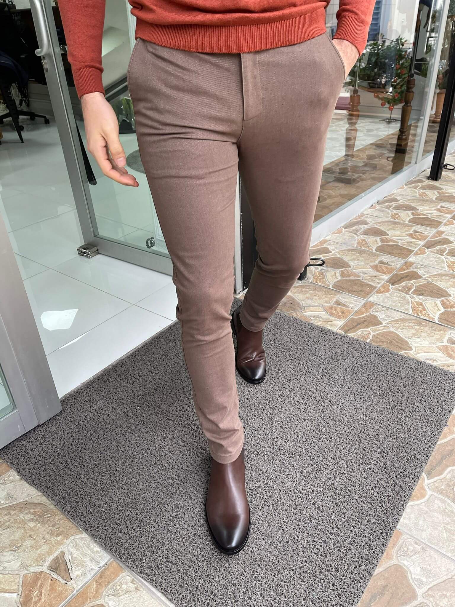 Light brown pants with a relaxed fit, perfect for casual outings.