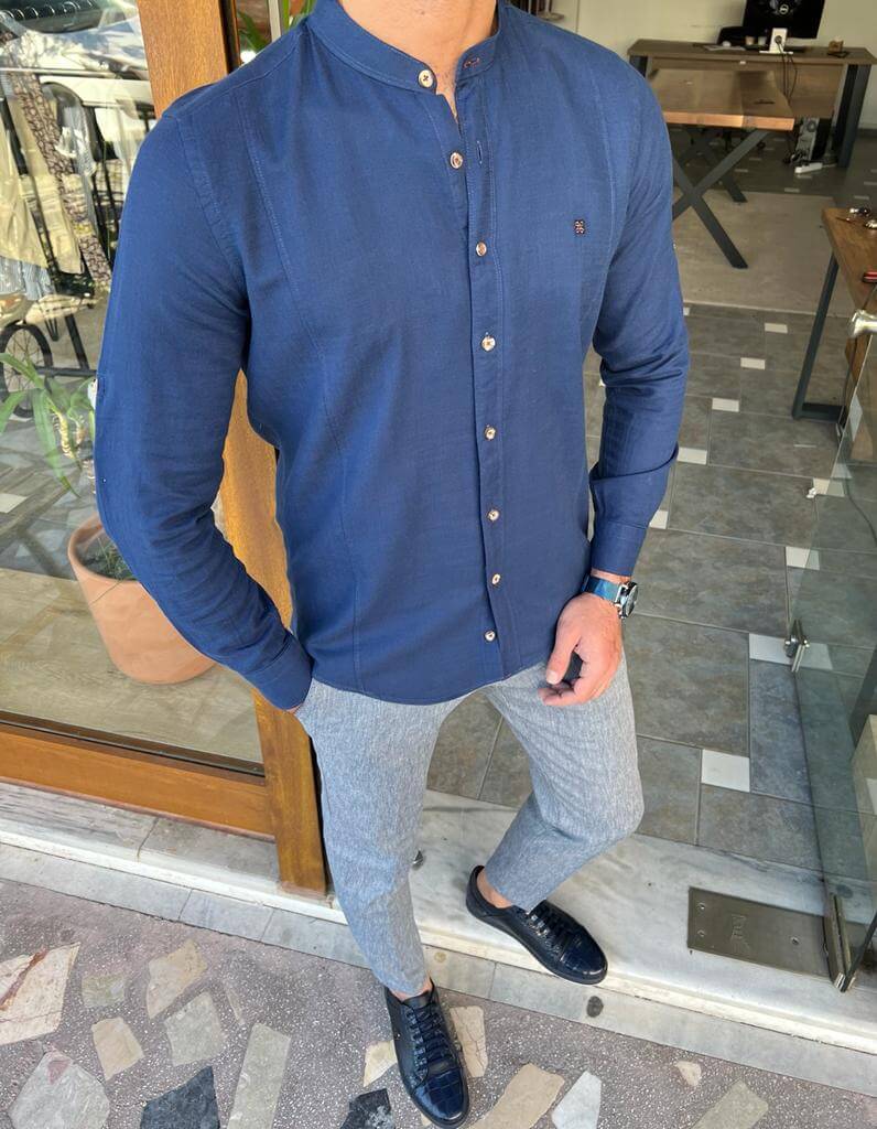 Blue cotton shirt with a collar and long sleeves