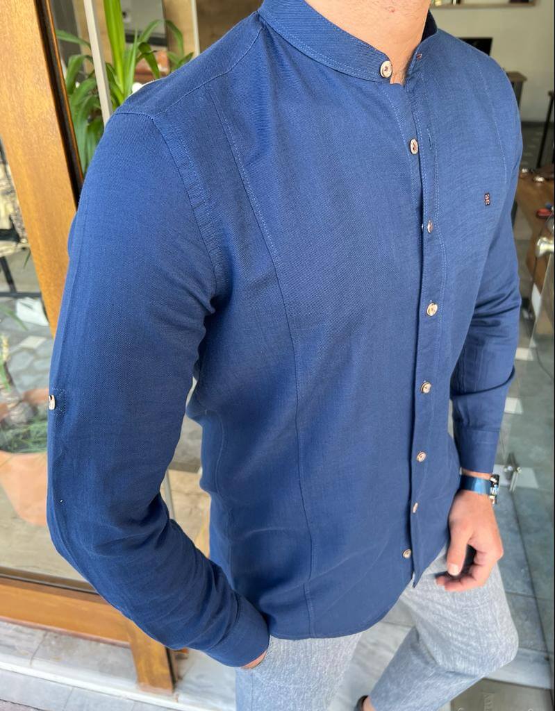 Blue cotton shirt with a collar and long sleeves